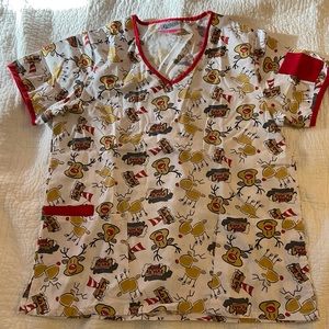 Christmas themed white and red scrub top